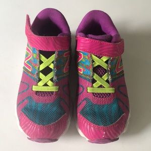 Little girl’s New Balance sneakers